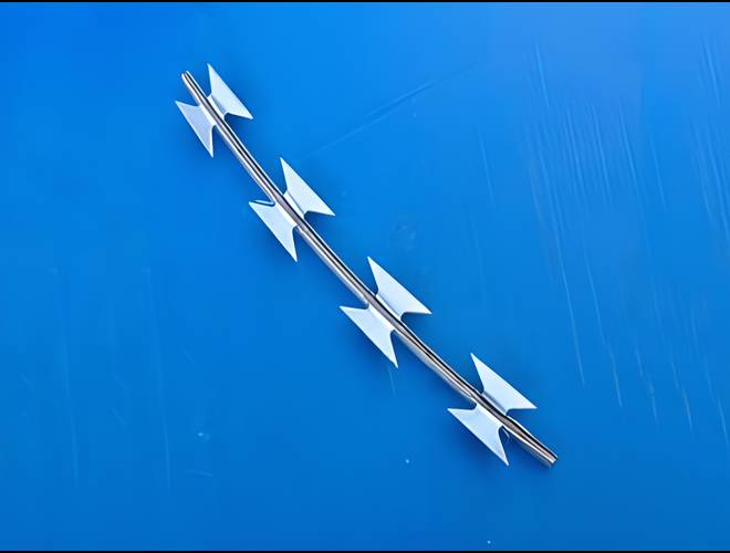 A small piece of BTO-22 concertina wire on the blue background.